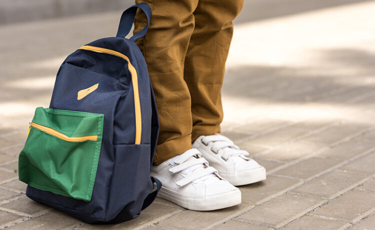 back to school shopping kid with backpack