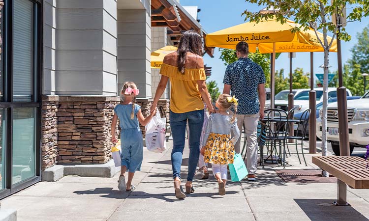 family shopping at Cascade Village Shopping Center