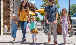 Family with young kids experiencing Bend shopping
