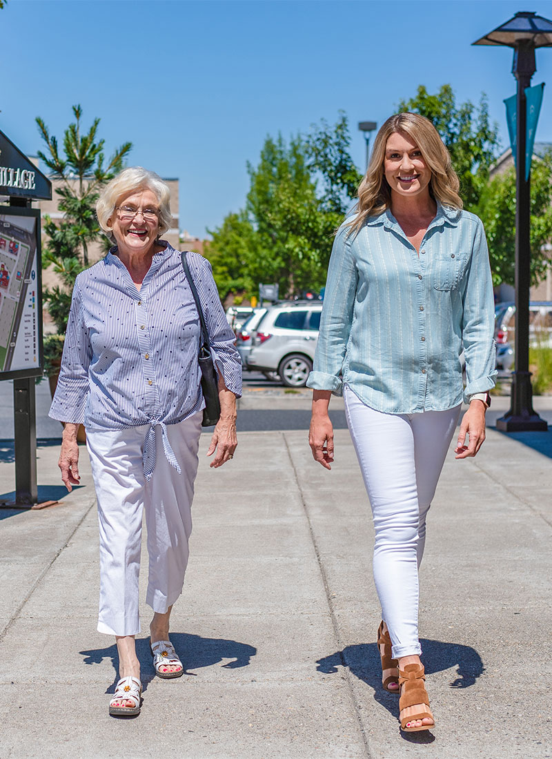 women-walking-through-shopping-center women exploring the best of bend shopping
